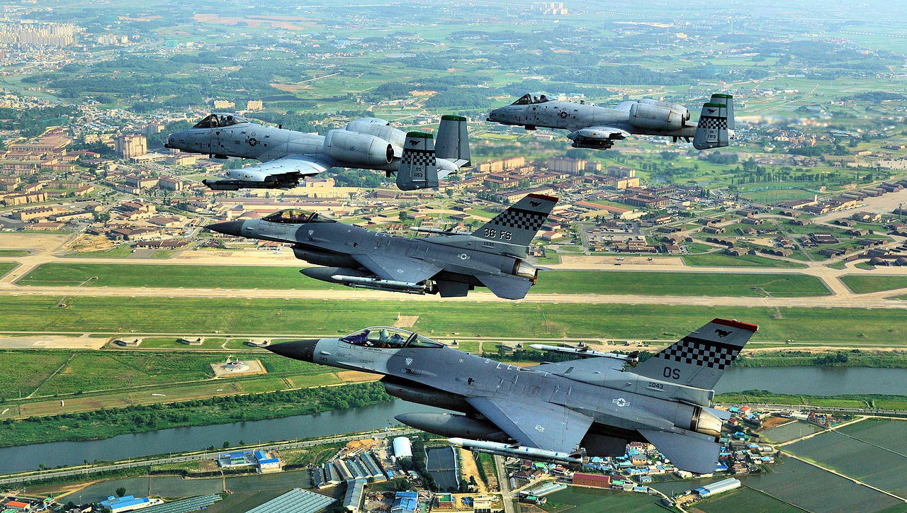 F-16 Falcons and A-10 Thunderbolt IIs fly over the Republic of Korea. Airmen from Osan joined Airmen from across the world to participate in Red Flag Alaska 09-03, scheduled for July 23 - Aug. 7. The